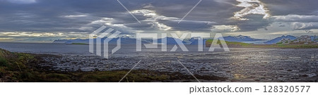 Panoramic view of Hofn Iceland with Vatnajokull glacier and dramatic sky Panoramic view of Hofn Iceland with Vatnajokull glacier and dramatic sky 128320577