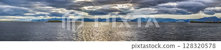 Panoramic view of Hofn Iceland with Vatnajokull glacier and dramatic sky Panoramic view of Hofn Iceland with Vatnajokull glacier and dramatic sky 128320578