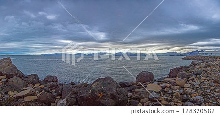 Panoramic view of Hofn Iceland with Vatnajokull glacier and dramatic sky Panoramic view of Hofn Iceland with Vatnajokull glacier and dramatic sky 128320582