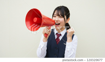 Image of "High school girls cheering with megaphones (in vest-type uniforms)" Image of "High school girls cheering with megaphones (in vest-type uniforms)" 128320677