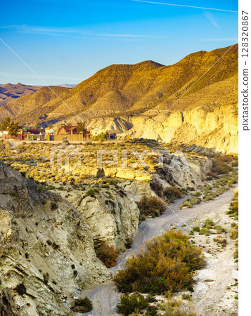 Tabernas desert view with Western Leone town, Spain 128320867