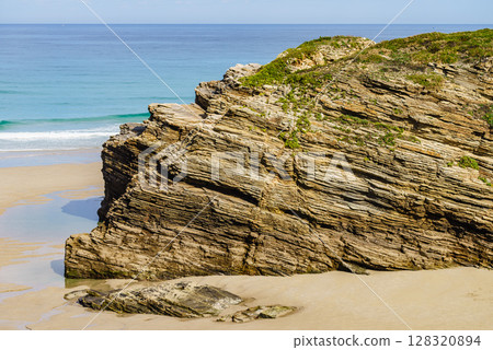Ocean at low tide. Cathedrals Beach in Galicia Spain. Ocean at low tide. Cathedrals Beach in Galicia Spain. 128320894
