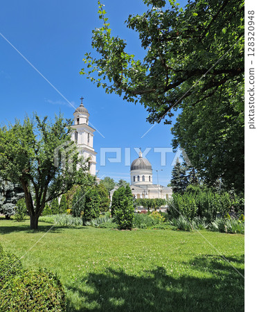 CHISINAU, MOLDOVA - JUNE 20, 2025 The Metropolitan Cathedral Nativity of the Lord with the bell tower, architectural centerpiece of moldovan capital. Summer season beautiful view to the landmark 128320948