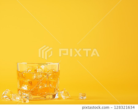 Refreshing whiskey glass with ice on a golden background, perfect for drink and beverage ads 128321634