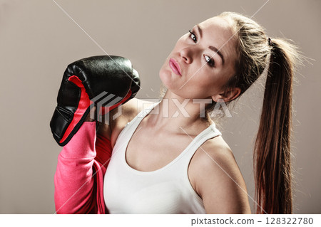 Feminist woman training, boxing. Feminist woman training, boxing. 128322780