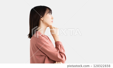 A woman thinking/businesswoman A woman thinking/businesswoman 128322838