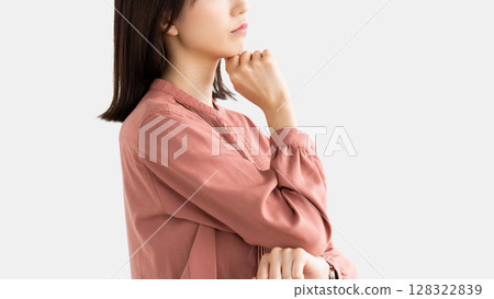 A woman thinking/businesswoman A woman thinking/businesswoman 128322839