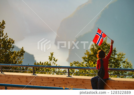Tourist enjoy fjord view on Stegastein viewpoint Norway 128322889