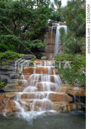 Beautiful waterfall in the China Garden in Montreal. 128324004