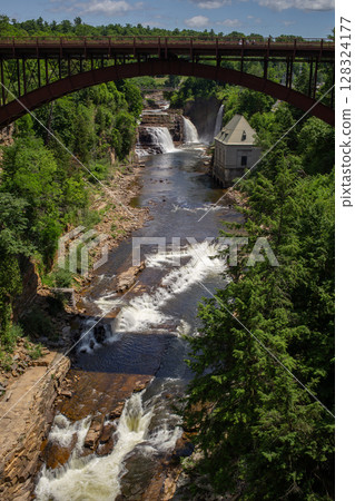 Rainbow Falls at Ausable Chasm in Upstate New York. Rainbow Falls at Ausable Chasm in Upstate New York. 128324177