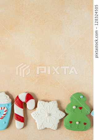Gingerbread cookies with icing decoration. Christmas food. Baking tradition on Holliday. Xmas tree sweet copy space background 128324505