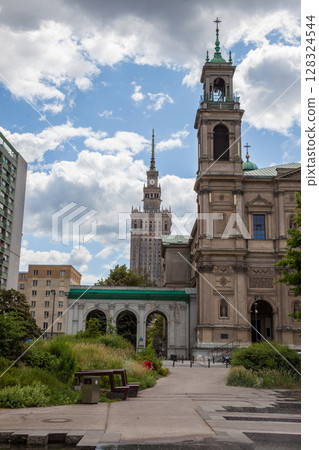 All Saints Church, Grzybowski Square Plac Grzybowski . Warsaw, Poland. houses and streets of the city center. Tourist route. Historical landmark. Old and new architecture. All Saints Church, Grzybowski Square Plac Grzybowski . Warsaw, Poland. houses and streets of the city center. Tourist route. Historical landmark. Old and new architecture. 128324544