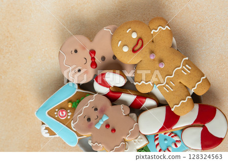 Gingerbread cookies. Christmas food. Gingerbread man. . Xmas sweets background Gingerbread cookies. Christmas food. Gingerbread man. . Xmas sweets background 128324563