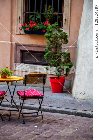 Outdoor Cafe Seating on Sidewalk Outdoor Cafe Seating on Sidewalk 128324597
