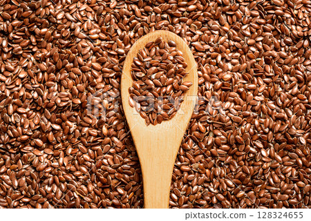 Linseed or flaxseed as background 128324655