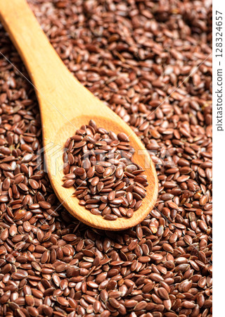 Flaxseed or linseed as background 128324657