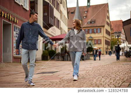 Young Cute Female Hugs Boyfriend. In Autumn Outdoor. Lovers Walking in Park. Attractive Funny Couple. Lovestory in Forest. Man and Woman. Cute Lovers in the Park. Family Concept. Happy Couple. Young Cute Female Hugs Boyfriend. In Autumn Outdoor. Lovers Walking in Park. Attractive Funny Couple. Lovestory in Forest. Man and Woman. Cute Lovers in the Park. Family Concept. Happy Couple. 128324788