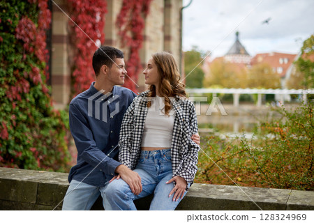 Young Cute Female Hugs Boyfriend. In Autumn Outdoor. Lovers Walking in Park. Attractive Funny Couple. Lovestory in Forest. Man and Woman. Cute Lovers in the Park. Family Concept. Happy Couple. Young Cute Female Hugs Boyfriend. In Autumn Outdoor. Lovers Walking in Park. Attractive Funny Couple. Lovestory in Forest. Man and Woman. Cute Lovers in the Park. Family Concept. Happy Couple. 128324969