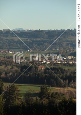 Beautiful view of a town with a church in the middle Beautiful view of a town with a church in the middle 128325561