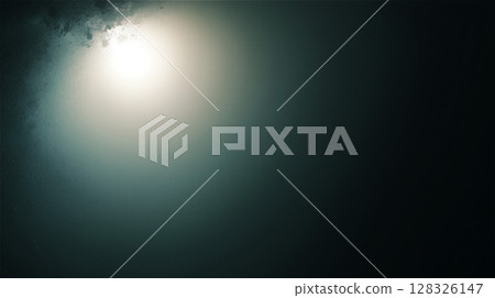 The space where light shines in creates a void background and an ominous atmosphere. 128326147