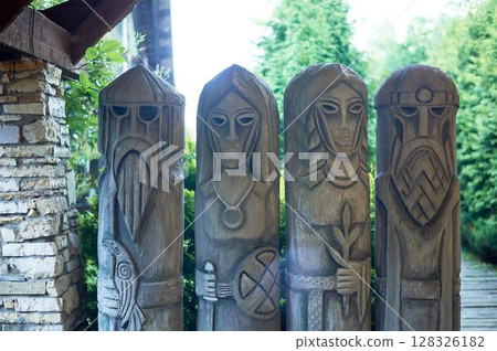 Columns of progenitors. Vikings. Stone sculptures. Gray Columns of progenitors. Vikings. Stone sculptures. Gray 128326182