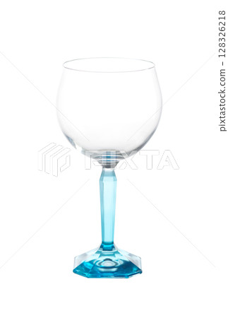Elegant empty wine glass with faceted turquoise stem and base, isolated on a white background. 128326218