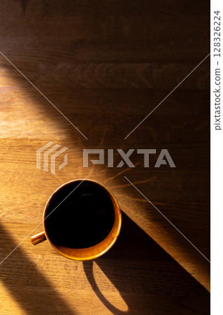 Coffee cup placed on the table 128326224