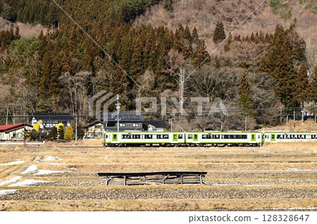 The Kamaishi Line as seen from the rice paddies near the Tono Kaze no Oka roadside station The Kamaishi Line as seen from the rice paddies near the Tono Kaze no Oka roadside station 128328647