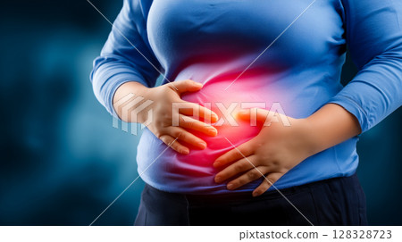 Abdominal obesity concept, close up of abdomen with visible fat bulges, health warning visual 128328723