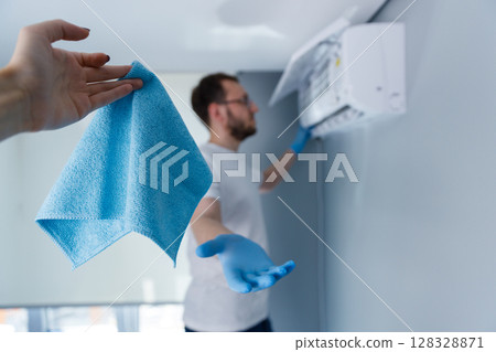 Professionally Maintaining Air Conditioning Units: The Importance of Regular Cleaning and Care for Optimal Performance and Longevity in Your Home Environment Professionally Maintaining Air Conditioning Units: The Importance of Regular Cleaning and Care for Optimal Performance and Longevity in Your Home Environment 128328871
