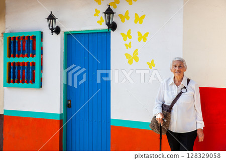 Senior woman at the beautiful colonial town of Concepcion located in the department of Antioquia in Colombia. 128329058