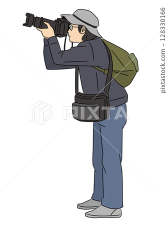 A man looking sideways with a camera A man looking sideways with a camera 128330166