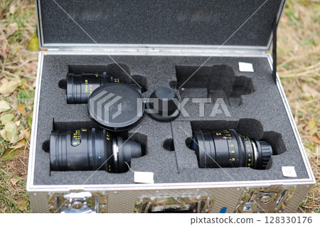 Professional Photography Gear: High-Quality Camera Lenses Stored in a Protective Case Designed for Optimal Portability and Security in Shooting Environments Professional Photography Gear: High-Quality Camera Lenses Stored in a Protective Case Designed for Optimal Portability and Security in Shooting Environments 128330176