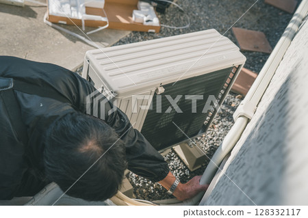 Air conditioner installation Air conditioner installation 128332117