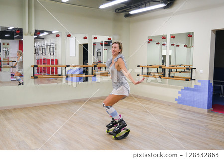 Girl in a Stylish kangoo shoes 128332863