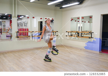 Girl in a Stylish kangoo shoes 128332865