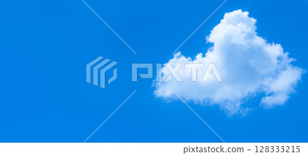 Simple landscape with blue sky and white clouds 128333215