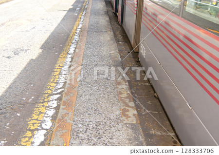 Narrow tram stop in Enkobashi-cho, photographed in July 2025 128333706