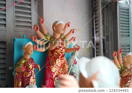 Half-Finished Durga Idol Awaits Final Touches in Kumartuli Workshop 128334491