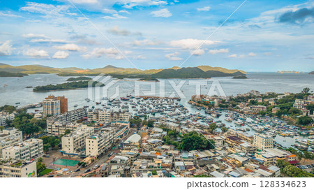 July 5 2025 Urban Landscape Overlooking Mountains and a Serene Coastal View July 5 2025 Urban Landscape Overlooking Mountains and a Serene Coastal View 128334623