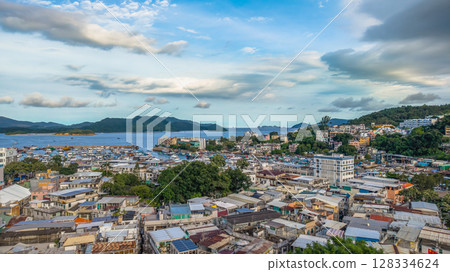 July 5 2025 Urban Landscape Overlooking Mountains and a Serene Coastal View 128334624