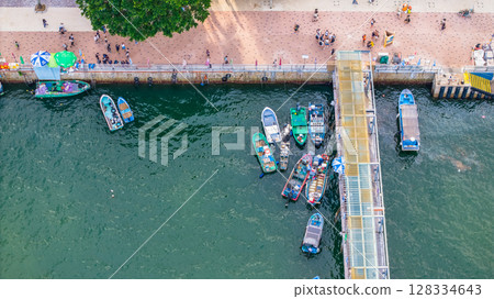 July 5 2025 Scenic Coastal Town by the Harbor with Boats and Hills 128334643