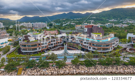 July 5 2025 Modern Building With Rooftop Pool Overlooking Scenic Greenery July 5 2025 Modern Building With Rooftop Pool Overlooking Scenic Greenery 128334677