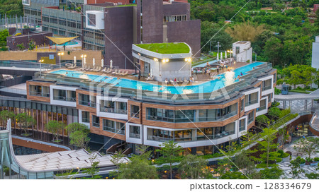 July 5 2025 Modern Building With Rooftop Pool Overlooking Scenic Greenery 128334679