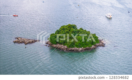 July 5 2025 Scenic View of Green Islands in a Beautiful Blue Sea by Mountains July 5 2025 Scenic View of Green Islands in a Beautiful Blue Sea by Mountains 128334682