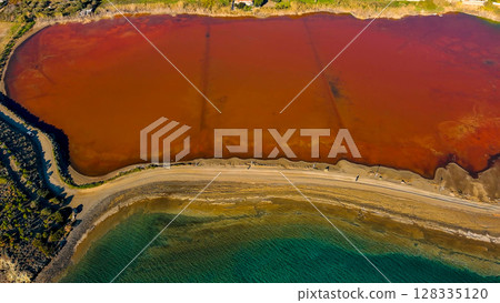 Red salt sea lake, at winter, village Alyki, Boeotia, Greece. Red salt sea lake, at winter, village Alyki, Boeotia, Greece. 128335120