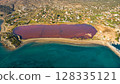Red salt sea lake, at winter, village Alyki, Boeotia, Greece. 128335121