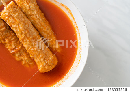 Omuk - Korean fish cake skewer in Korean spicy soup Omuk - Korean fish cake skewer in Korean spicy soup 128335226