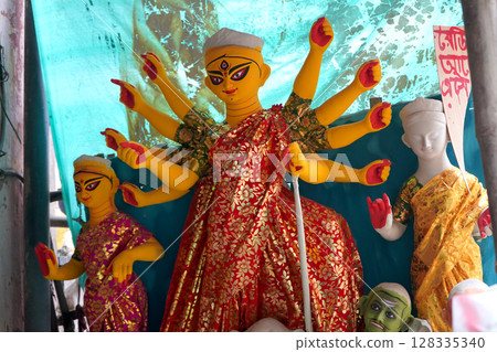 Vibrant Yellow Durga Idol Awaits Completion in Kumartuli Workshop Vibrant Yellow Durga Idol Awaits Completion in Kumartuli Workshop 128335340