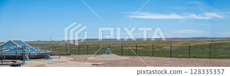 View of the Delta-09 Minuteman Missile Silo in the barren landscape of South Dakota View of the Delta-09 Minuteman Missile Silo in the barren landscape of South Dakota 128335357